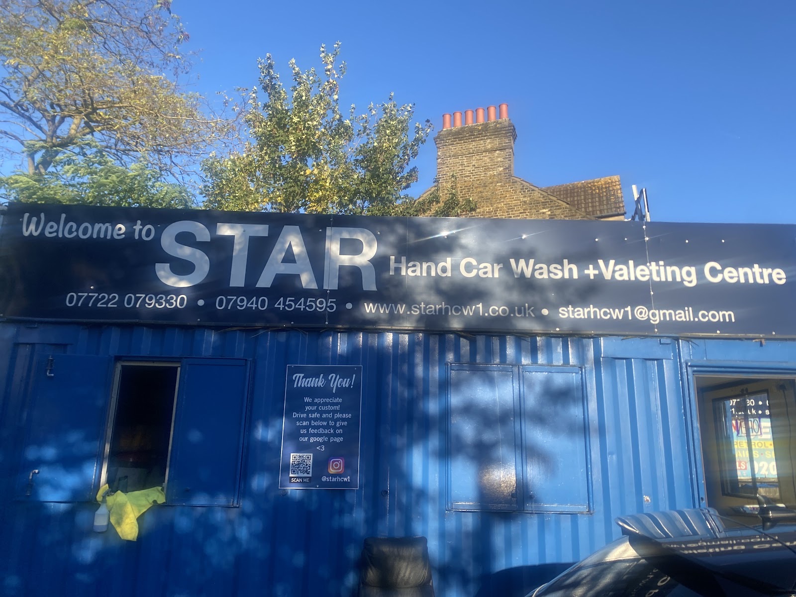 The 5 Star Hand Car Wash and Valeting shopfront on Brigstock Rd with the workshop door open